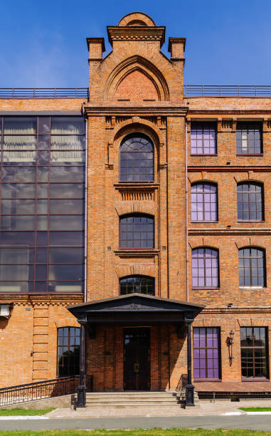 Facade of a modern loft-style office building rebuilt from an old steam mill stock photo