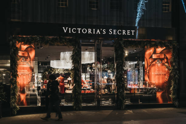 Facade of closed Victorias Secret shop in Bond Street, London, UK, people walk by, motion blur. stock photo