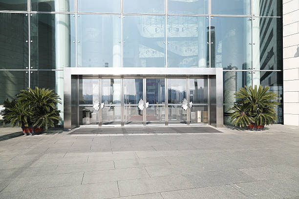 Facade of modern Business Center with glass doors stock photo