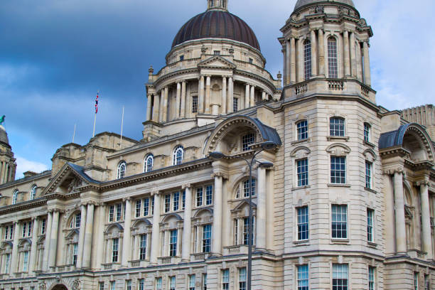 Facade of Port of Liverpool Building (or Dock Office) in Pier Head, along the Liverpool's waterfront, England, United Kingdom Facade of Port of Liverpool Building (or Dock Office) in Pier Head, along the Liverpool's waterfront, England, United Kingdom liverpool docks and harbour building stock pictures, royalty-free photos & images