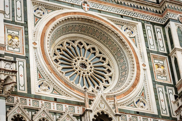 Facade of the Duomo of Santa Maria del Fiore - Florence Cathedral Florence Cathedral, Duomo of Santa Maria del Fiore, closeup of the Main Facade with the Rose Window. UNESCO world heritage site, Tuscany, Italy, Europe florence italy photos stock pictures, royalty-free photos & images