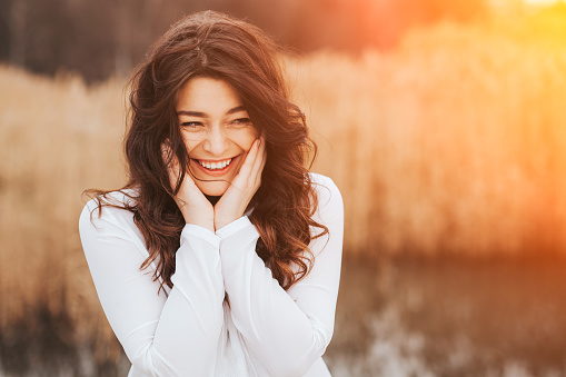 Face laughing woman outdoors stock photo