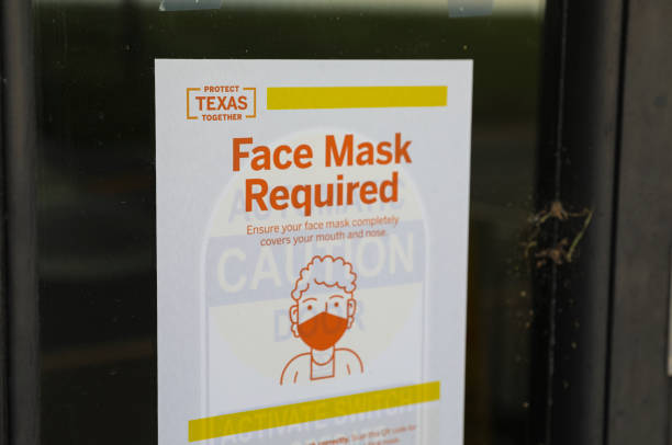 Face mask required sign advertisement stock photo