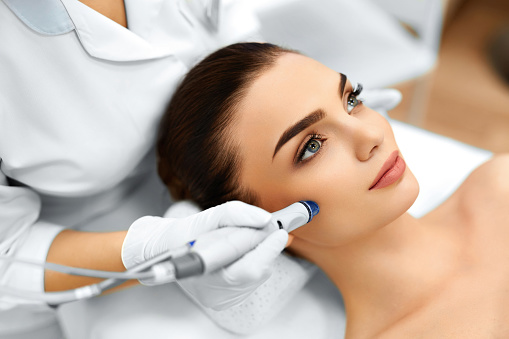 https://media.istockphoto.com/photos/face-skin-care-facial-hydro-microdermabrasion-peeling-treatment-picture-id501398516?k=6&m=501398516&s=170667a&w=0&h=dhYazb59OC7uCMrxULduSZt6rf7yoWb0lWuxp5XBFKk=