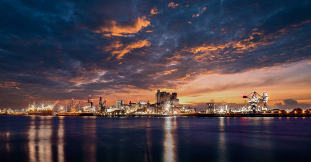 Facilities at Rotterdam Harbor by Sunset stock photo