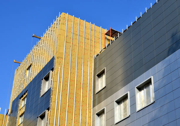Facing of the building ventilated facade. Aluminum colored facades stock photo