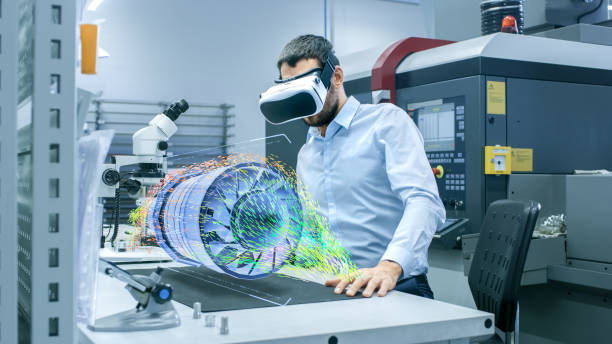 Factory Chief Engineer Wearing VR Headset Designs Engine Turbine on the Holographic Projection Table.  Futuristic Design of Virtual Mixed Reality Application. Factory Chief Engineer Wearing VR Headset Designs Engine Turbine on the Holographic Projection Table.  Futuristic Design of Virtual Mixed Reality Application. augmented reality stock pictures, royalty-free photos & images