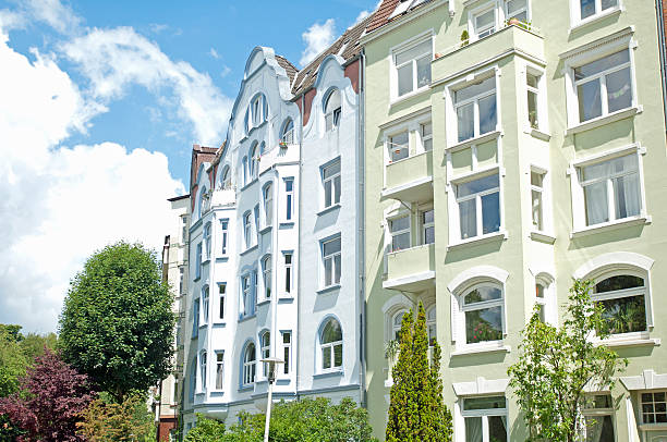 Fae_ade of apartment building with trees in Kiel, Germany stock photo