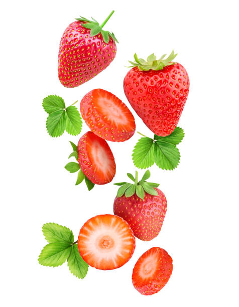 Falling strawberries isolated on white background Falling strawberries isolated on white background with clipping path; leaf strawberries stock pictures, royalty-free photos & images