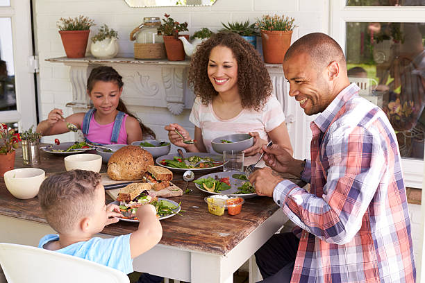 Family Eating Dinner Stock Photos Pictures Royalty Free Images
