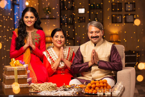 Family Diwali Celebrate - stock photo Indian, Indian Culture, Festival, Diwali, mithai stock pictures, royalty-free photos & images