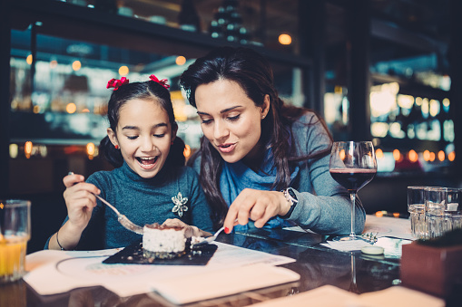 Family Eating In Restaurant Stock Photo - Download Image Now - iStock