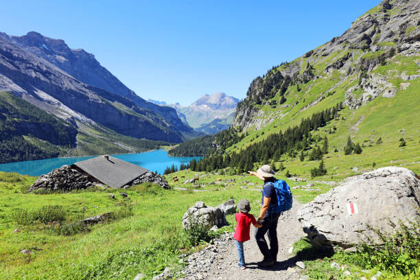 Family Hiking in the Swiss Mountains stock photo