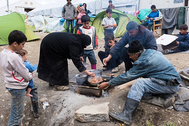 Family in refugees camp in Greece stock photo