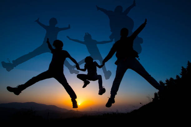 Family jump in the nature. Experimental Abstraction stock photo