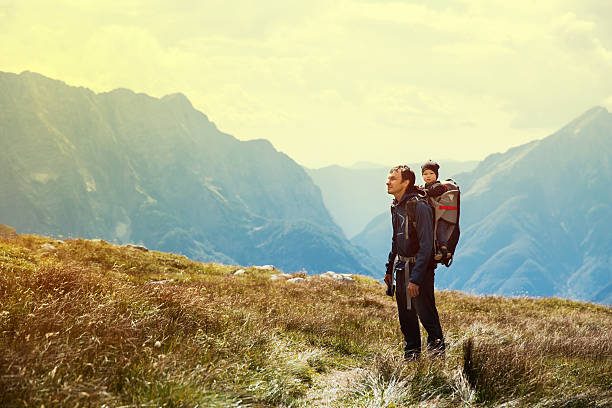 family on a trekking day in the mountains - klimbos stockfoto's en -beelden