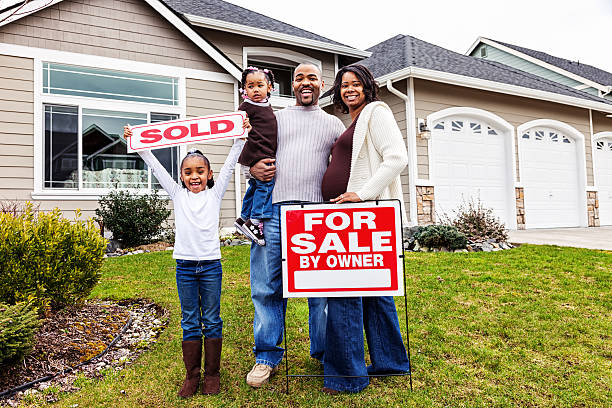 Family with Sold Home stock photo