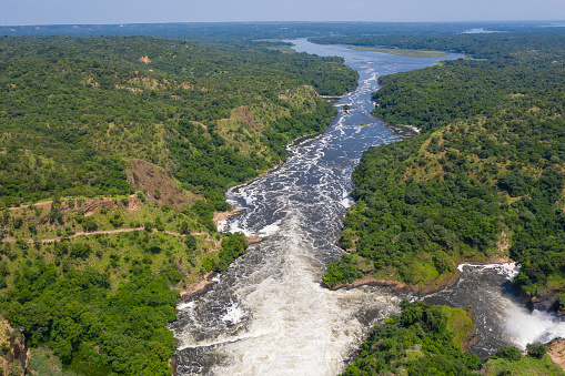Murchison Falls (also known as Kabalega Falls) at the Nile River in Uganda. The Falls are in the Murchison Falls National Park, which is one of the main tourist destinations in Uganda. The location is between Lake Kyoga and Lake Albert on the Victoria Nile.
