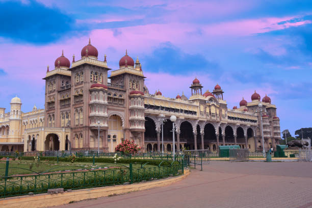 Famous Mysore Palace At Sunset Famous Mysore Palace At Sunset mysore stock pictures, royalty-free photos & images