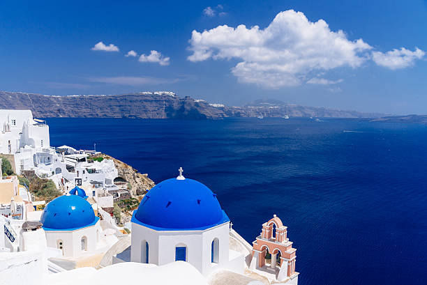 Famous Santorini blue dome churches stock photo
