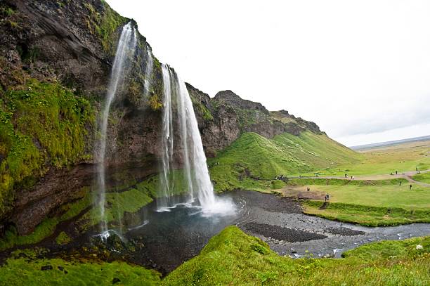 famous Seljalandsfoss waterfall, popular tourist spot in Iceland stock photo