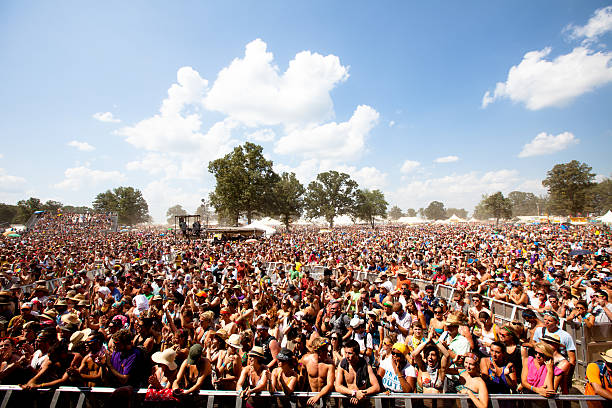 Fans waiting for the next performance at Bonnaroo Music Festival stock photo