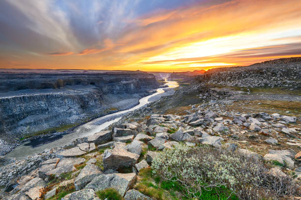 Fantastic sunset view of canyon from Dettifoss to Asbyrgi Fantastic sunset view of canyon from Dettifoss to Asbyrgi. Location: Vatnajokull National Park,  river Jokulsa a Fjollum, Northeast Iceland, Europe iceland dettifoss stock pictures, royalty-free photos & images
