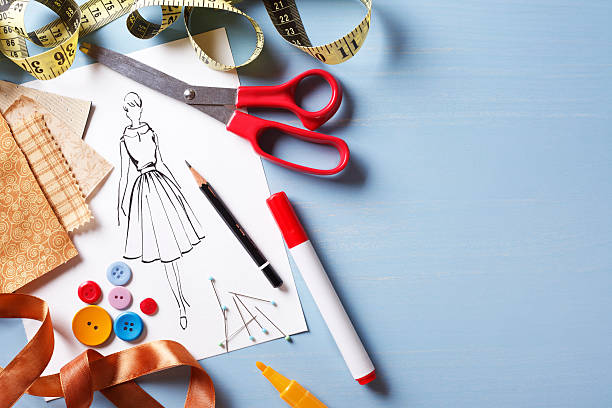 Fashion Design Fashion design background with sketch and sewing equipments. fashion design sketches stock pictures, royalty-free photos & images
