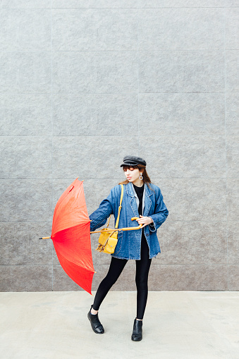 Fashion Model playing umbrella
