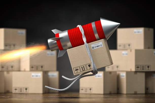 Fast delivery packet or parcel concept. Rocket with cardpoard box. stock photo