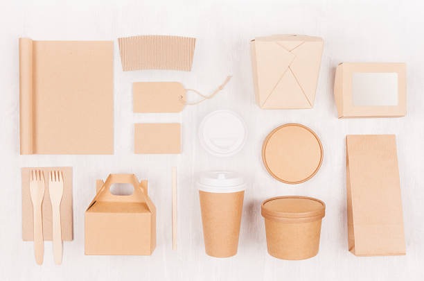 Fast food template for branding identity - blank kraft paper notebook, coffee cup, label, card, box for noodles, sushi, soup, burger on white wood board. Fast food template for branding identity - blank kraft paper notebook, coffee cup, label, card, box for noodles, sushi, soup, burger on white wood board. burger wrapped in paper stock pictures, royalty-free photos & images