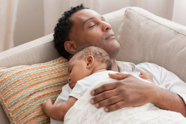 Father and daughter having a relaxation time stock photo