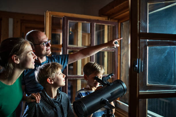 Father and kids observing the moon and the stars Father and three kids are using the astronomy telescope to observe the moon and the stars.
Nikon D850 astronomy telescope stock pictures, royalty-free photos & images