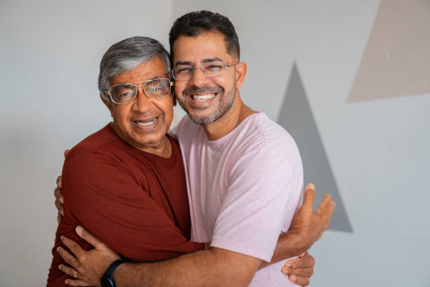 Father and son hugging Love, Father, Son, Embracing, Home Interior fathers day stock pictures, royalty-free photos & images