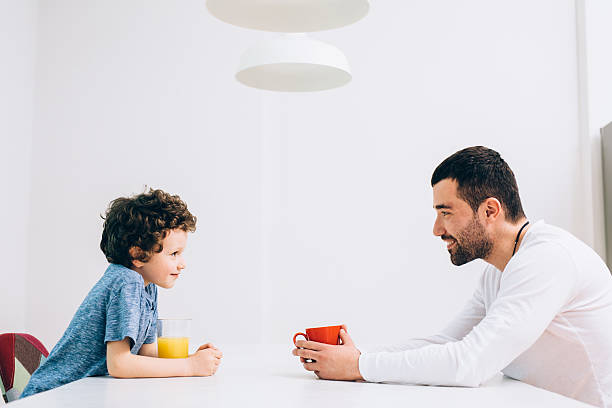 Father and son time Father spending time with his son. curley cup stock pictures, royalty-free photos & images