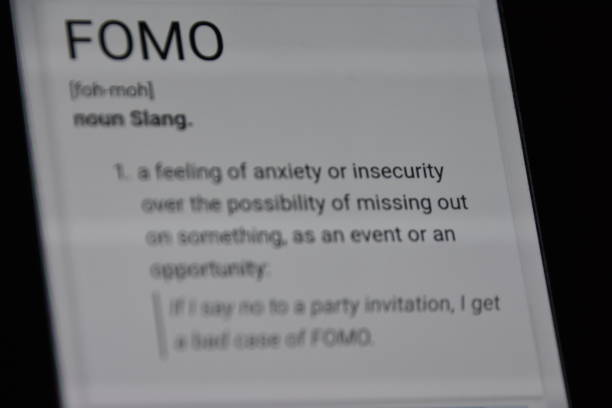 FOMO - Fear of Missing Out...social networking problem FOMO - Fear of Missing Out fomo stock pictures, royalty-free photos & images