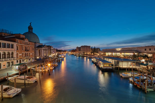VENICE, ITALY February 16 , 2020 Panoramic sunset view. View of the Grand Canal from the Bridge of the Barefoot (Ponte degli Scalzi). stock photo