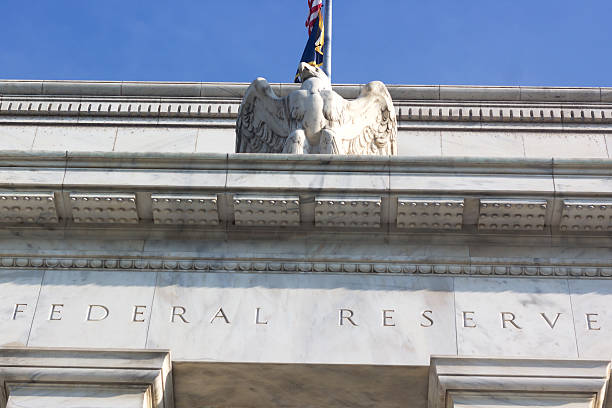 Federal Reserve building in Washington DC, USA Close up of the Federal Reserve building with the eagle statue. federal reserve stock pictures, royalty-free photos & images