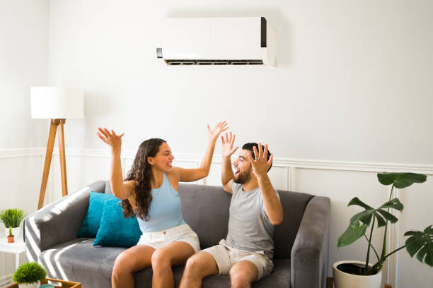 Feeling thankful for the air conditioning stock photo