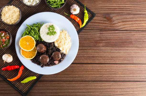 Feijoada typical Brazilian food. Traditional Brazilian food made with black beans. Top view. copy space stock photo