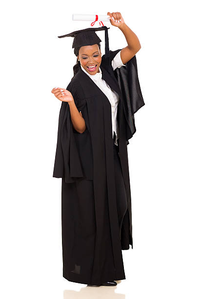 African College Student In Graduation Gown Dancing Stock Photos ...