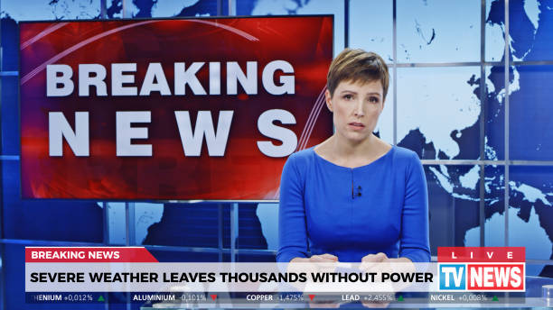 Female anchor presenting breaking news about severe weather causing power outage Female anchor presenting breaking news about extreme weather causing power outage. breaking news stock pictures, royalty-free photos & images