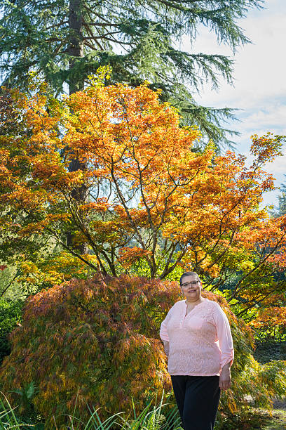 Female Cancer Survivor Enjoying Beautiful Day Outdoors stock photo