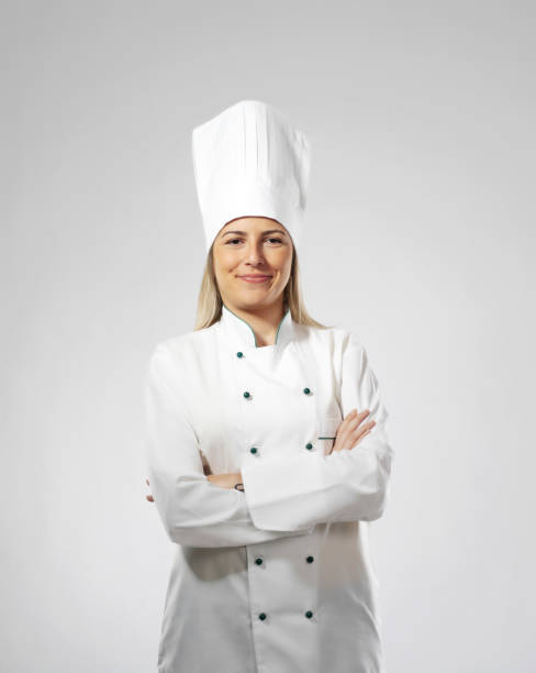 Female chef portrait Female chef portrait on white background chef stock pictures, royalty-free photos & images