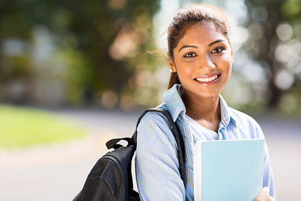 female college student on campus stock photo