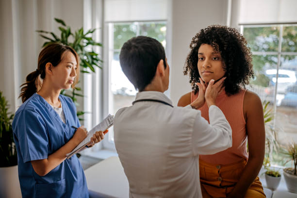 Female doctor doing a medical examination stock photo