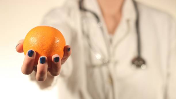 Image result for doctor holding oranges