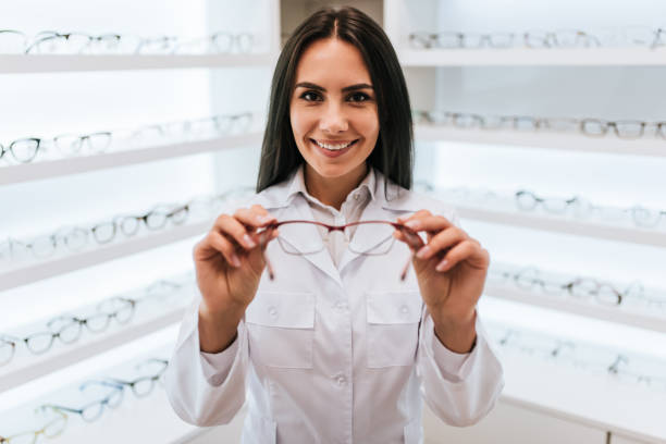 Female doctor in ophthalmology clinic stock photo