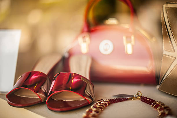 Female fashion accessories in red and gold stock photo