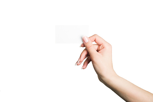 female hand holding a blank business card stock photo